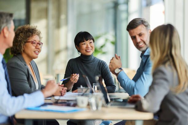 Business professionals in a meeting discussing coverage options